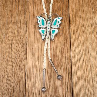 Lambert Homer, Jr. (Zuni, 20th century) Silver, Shell, and Turquoise Butterfly Bolo Tie, ex. C.G. Wallace Collection