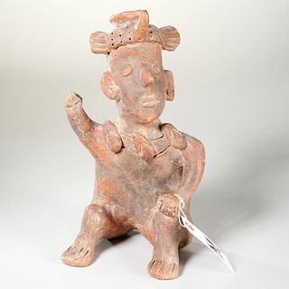 Pre Columbian style seated earthenware figure