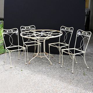 Yellow painted wrought iron patio set