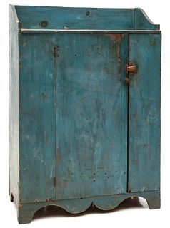 A SMALL NEW ENGLAND STORAGE CUPBOARD IN BLUE PAINT