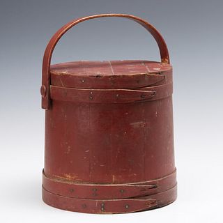 A 19TH CENTURY FIRKIN IN OLD RED PAINT