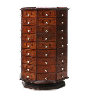 AN EIGHT SIDED 72-DRAWER REVOLVING NUT AND BOLT CABINET