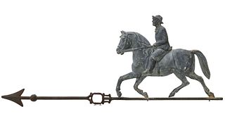 A LIGHTNING ROD WEATHER VANE WITH HORSE AND RIDER