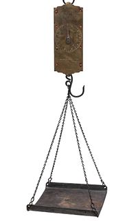 A SUSPENDED BRASS DIAL SCALE WITH TIN PAN