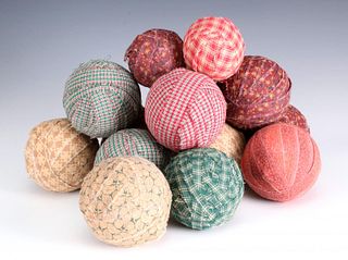 A COLLECTION OF DECORATIVE RAG BALLS