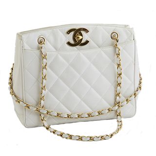Chanel White Caviar Quilted Leather Shoulder Bag, c. 1985, with gold tone chain-link woven leather double straps, the "CC" turn-lock...