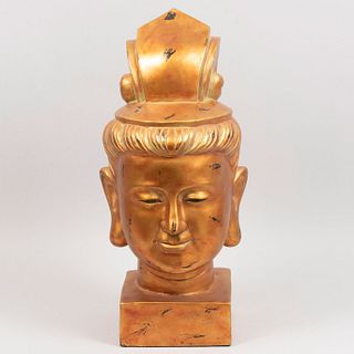 Cabeza del Príncipe Siddharta Gautama (Buda). Origen oriental. Siglo XX. Elaborada en resina dorada.