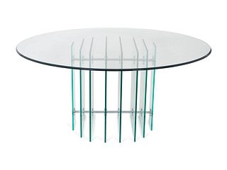 A Modernist Glass and Aluminum Circular Dining Table
Height 33 x diameter 60 inches.