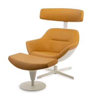 A Post Modern Leather Upholstered Lounge Chair and Ottoman
Chair, height 40 3/4 x width 30 1/2 inches.