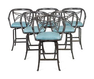 A Set of Six Patinated Metal Bar Stools
Height 50 inches.