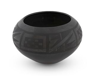A San IldefonsoBlackware Bowl
Height 6 1/2 inches.