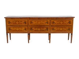 A Milanese Neoclassical Style Marquetry Chest of Drawers
Height 32 1/2 x length 82 x depth 16 inches.