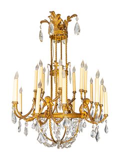 A Louis XVI Style Gilt-Bronze and Glass Twenty-Light Chandelier
Height 42 x diameter 26 inches.