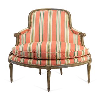 A Louis XVI Carved and Painted Corner Chair
Height 38 3/4 x width 45 inches.