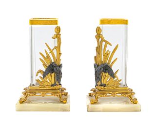 A Pair of Parcel-Gilt and Patinated Bronze and Glass Vases
Height 10 x width 6 x depth 5 1/2 inches.