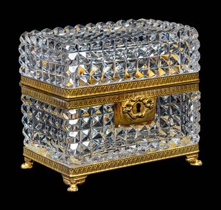 A French Gilt-Metal-Mounted Cut Glass Covered Box
Height 5 x length 5 1/2 x depth 4 inches.