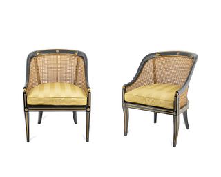 A Pair of Regency Style Parcel-Gilt, Caned and Ebonized Tub Chairs
Height 31 1/2 x width 23 x depth 25 1/4 inches.