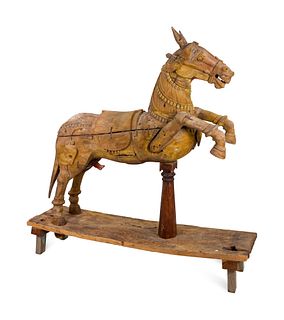 A South Indian Stripped Wood Model of a Chariot Horse
Height 79 1/2 x length 79 x depth 20 1/2 inches.