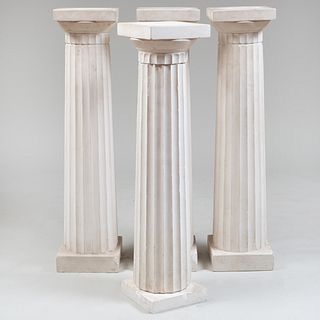 Group of Four White Plaster Fluted Pedestals