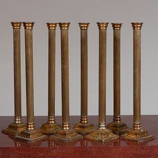 Group of Eight Tall Brass Reeded Columnar Candlesticks, Probably English