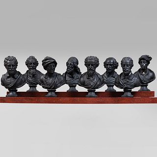 Group of Eight Ebonized Plaster Busts of Learned Gentlemen