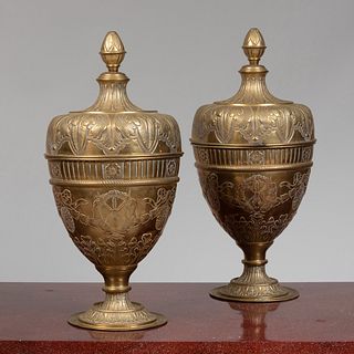 Pair of Continental Brass RepoussÃ© Urns and Covers