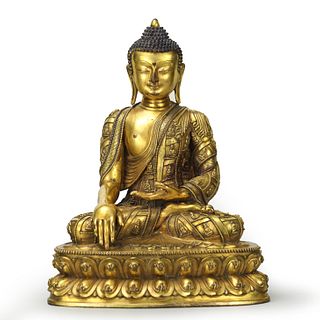 A Gilt Bronze Figure of Sakyamuni Buddha with