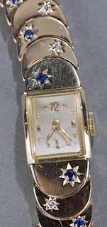 Concord 14kt gold diamond and sapphire retro watch