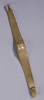 Omega ladies 18kt gold 17 jewel wrist watch.