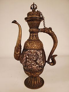An ornate large gilt-metal Sino/Tibetan ewer with