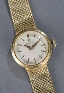 Omega ladies 18kt gold case and band.