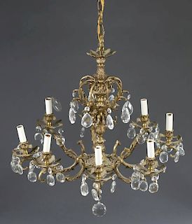 Gilt metal & crystal electric chandelier.