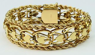 HEAVY LARGE 14KT Y GOLD BRACELET WITH HEARTS