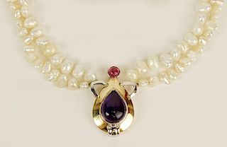 Lady's vintage cabochon amethyst, cabochon pink sapphire, 14 k and baroque pearl necklace.