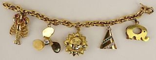 Lady's vintage 18 karat yellow gold charm bracelet.