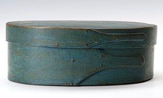 A SHAKER QUALITY OVAL PANTRY BOX IN OLD BLUE PAINT