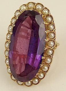 Lady's vintage large oval cut amethyst, seed pearl and 14 karat yellow gold ring.