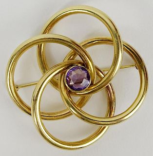 Lady's vintage gold filled and amethyst brooch.