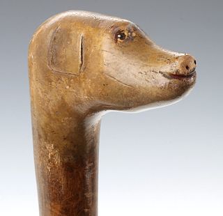 A 19TH CENTURY AMERICAN CARVED, PAINTED DOG HEAD CANE