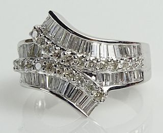 Lady's approx. 2.50 Carat Round and Baguette Cut Diamond and 18 Karat White Gold Ring.