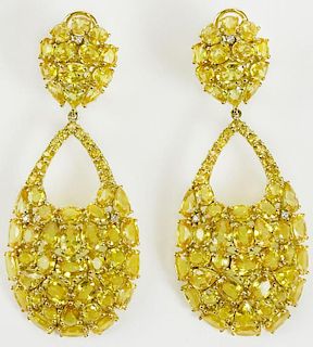 Pair of lady's fine quality approx. 48.0 carat mixed cut yellow sapphire.