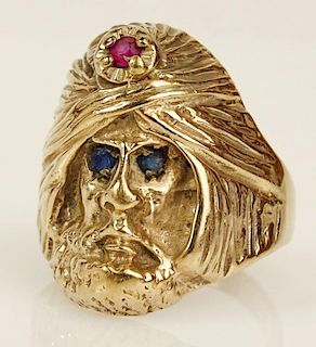 Vintage 14 karat yellow gold Arab man ring with ruby and sapphire accents.