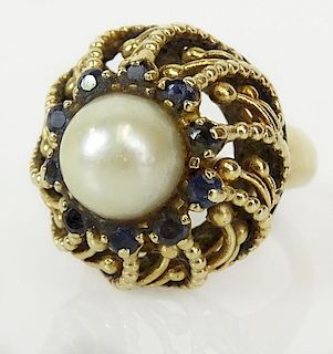 Lady's vintage 14 karat yellow gold, pearl and sapphire ring.