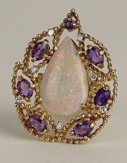 Vintage Pear Shape White Opal and 14 Karat Yellow Gold Ring/Pendant.