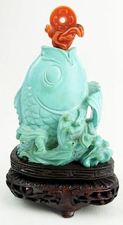 Vintage Chinese Carved Turquoise Spouting Fish Snuff Bottle on Hardwood Stand.