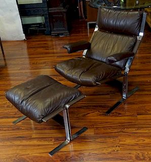 Vintage Brown Leather and Chromed Metal Recliner and Ottoman.