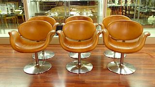 Set of six (6) Artifort leather tulip chairs. Round chrome bases.