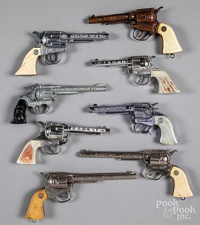 Eight vintage western cap guns