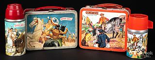 Two Western theme tin lunch boxes with thermos