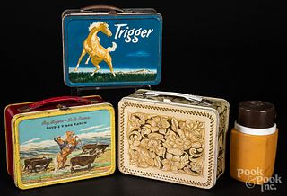 Three western theme tin lunch boxes